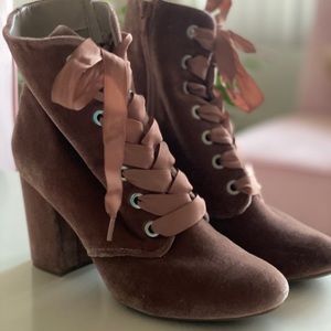 Pink suede high heeled booties